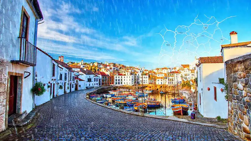 Pueblo gallego pintoresco bajo lluvia