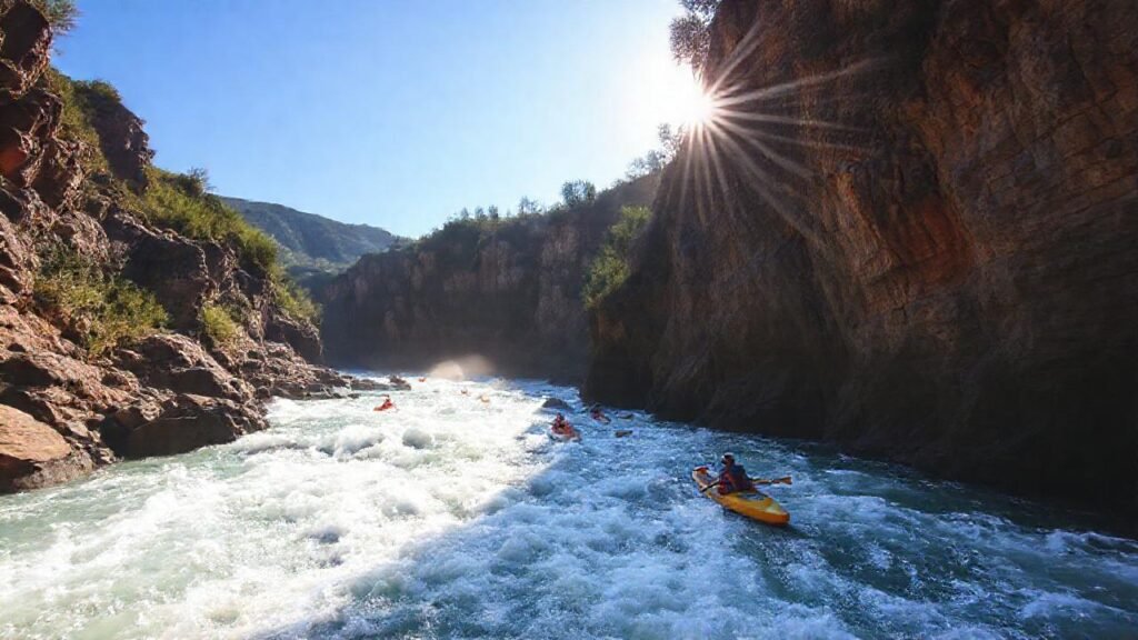 Kayakers navegan rápidos gallegos impresionantes